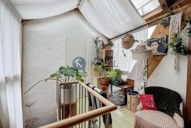 Au coeur de la ville : Immeuble résidentiel et commercial