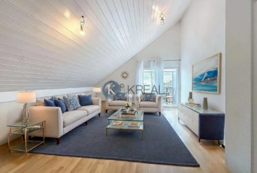 Appartement moderne avec balcon et place de parc intérieure