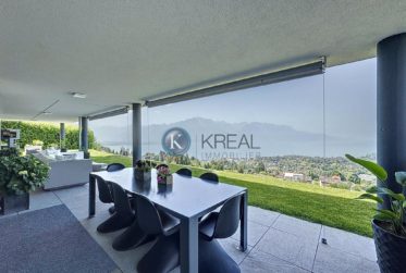 Appartement d’exception avec vue panoramique imprenable sur le lac et les Alpes