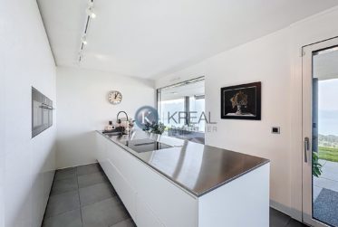 Appartement d’exception avec vue panoramique imprenable sur le lac et les Alpes