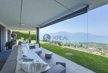 Appartement d’exception avec vue panoramique imprenable sur le lac et les Alpes