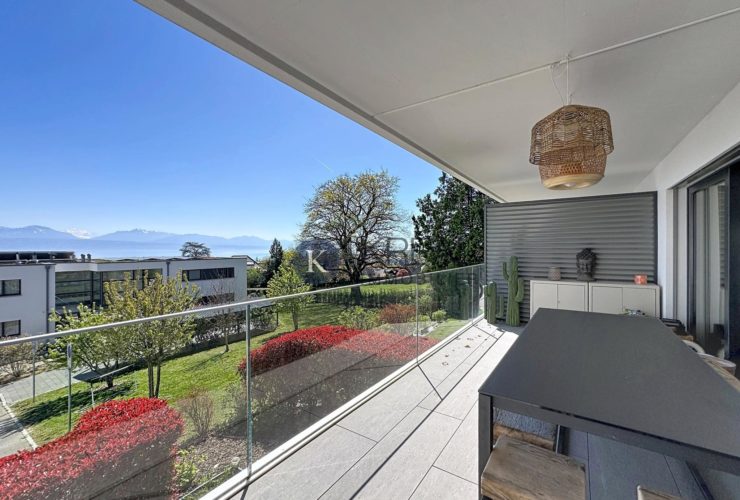 Cadre de vie privilégié : 4,5 pièces moderne avec balcon et vue exceptionnelle sur le lac