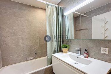 Cadre de vie privilégié : 4,5 pièces moderne avec balcon et vue exceptionnelle sur le lac