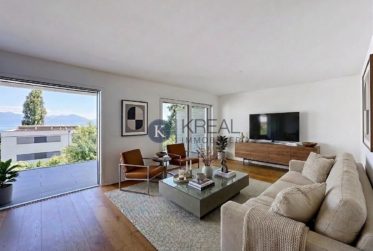 Cadre de vie privilégié : 4,5 pièces moderne avec balcon et vue exceptionnelle sur le lac
