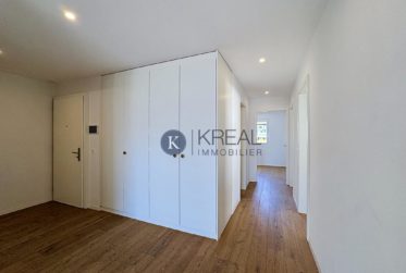 Cadre de vie privilégié : 4,5 pièces moderne avec balcon et vue exceptionnelle sur le lac